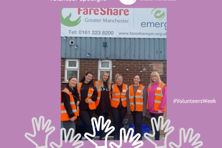 Group of corporate volunteers stading outside FareShare Greater Manchester HQ