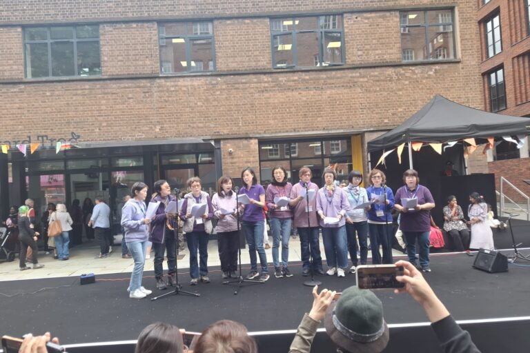 Choir performing at the Mustard Tree street party