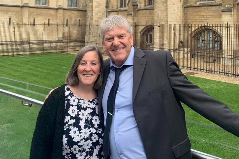 Ged and Julie outside the Houses of Parliament