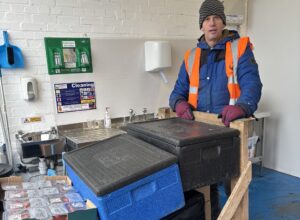 Images shows Jeff from Fresh picking up food from FareShare Plus