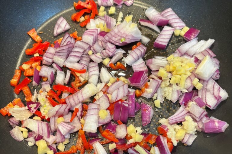 chopped onions, garlic, ginger and chilli in a pan